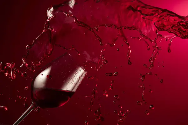 Glass Red Wine Splash Dark Red Background Copy Space Stock Picture