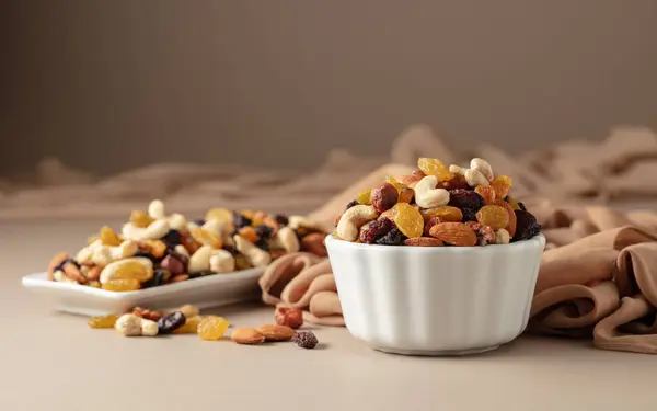 Mix Various Nuts Raisins White Bowl Beige Background Royalty Free Stock Images