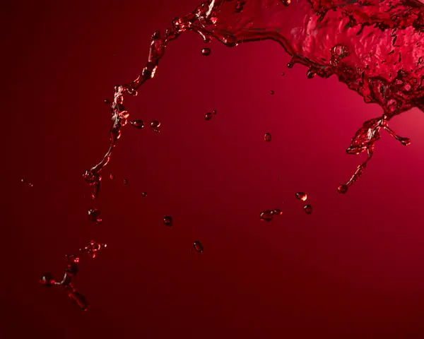 Red Wine Splash Dark Red Background Copy Space — Stock Photo, Image