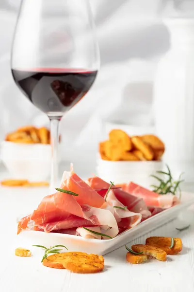 Prosciutto Spicy Bruschetta Crackers Glass Red Wine White Wooden Table — Stock Photo, Image
