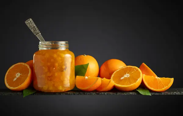 Orange Jam Glass Jar Fresh Fruits Sweet Confiture Black Background Stok Gambar Bebas Royalti