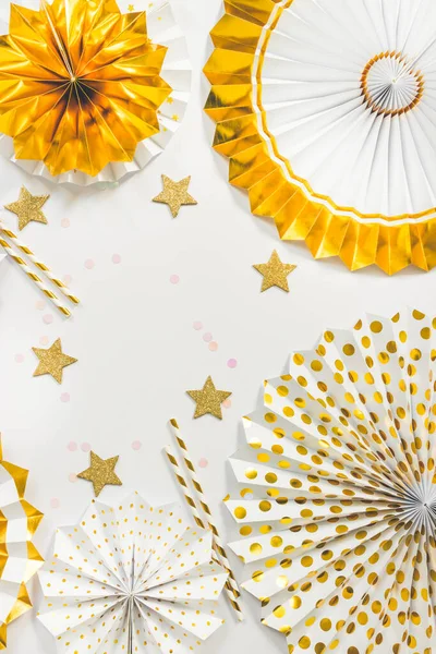 Party  background with paper fans, party decoration, party celebration in white and golden tone