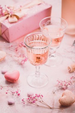 Rose sparkling wine, french macarons and box of chocolates for Valentime, mothers day or birthday