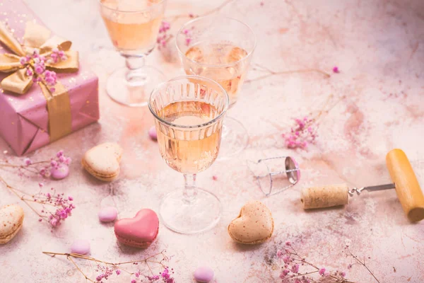 Rose sparkling wine, french macarons and box of chocolates for Valentime, mothers day or birthday