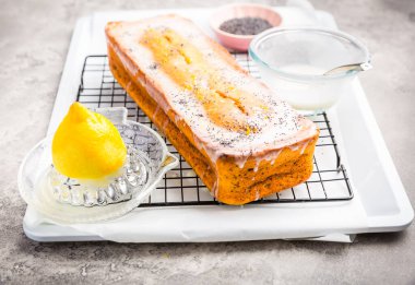 Lemon poppy cake with sugar sweet icing, emon pound cake loaf 