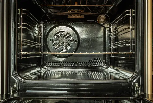 Empty electric oven with hot air ventilation