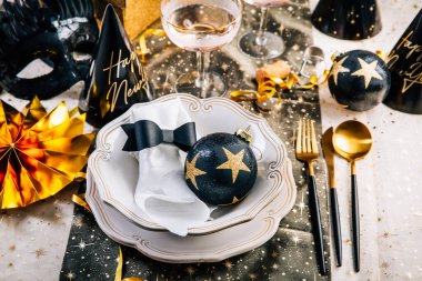 Elegant place setting for Christmas, New Years Eve, glasses of sparkling wine clipart