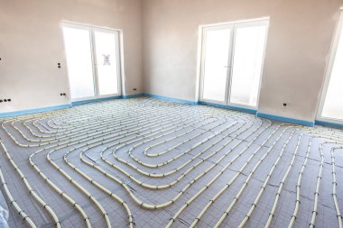 underfloor heating system in construction of new residential house