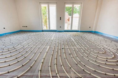 underfloor heating system in construction of new residential house