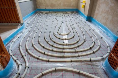 underfloor heating system in construction of new residential house