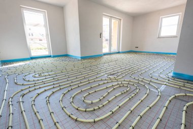 underfloor heating system in construction of new residential house