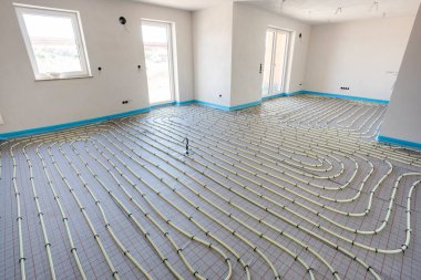 underfloor heating system in construction of new residential house