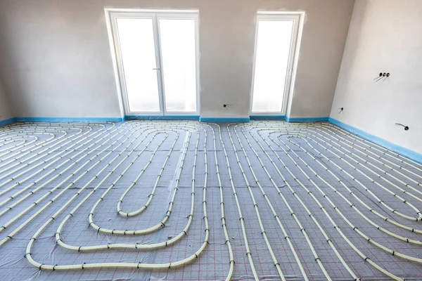 Sistem Pemanas Bawah Lantai Dalam Pembangunan Rumah Baru Yang Dibangun — Stok Foto