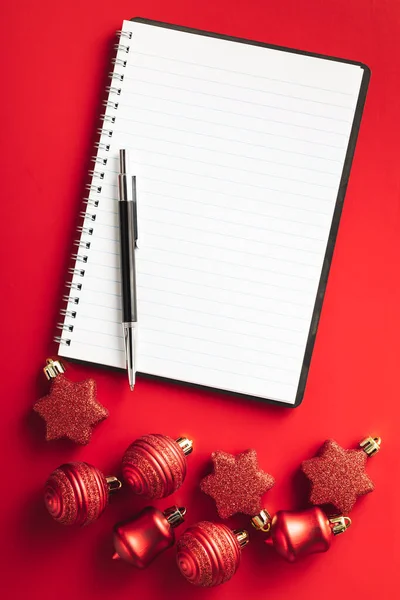 Red Christmas Decoration Christmas Bulbs Blank Notebook Red Background Top — Stock Photo, Image