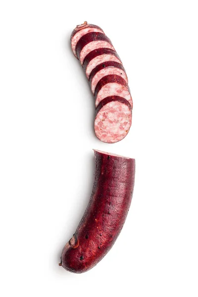 Sliced smoked pork sausage isolated on the white background.