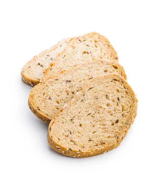 全粒穀物パンをスライス 白い背景に隔離された種とおいしい全粒粉のペストリー — ストック写真