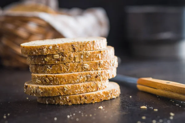 Sliced Whole Grain Bread Tasty Wholegrain Pastry Seeds Black Table — Stock Photo, Image