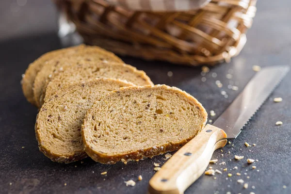 Sliced Whole Grain Bread Tasty Wholegrain Pastry Seeds Black Table — Stock Photo, Image