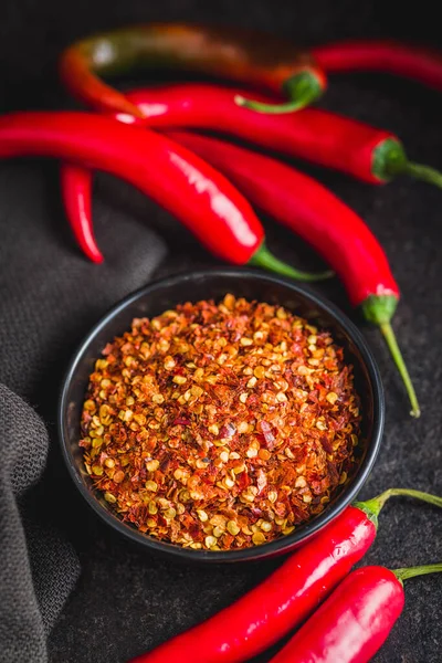 Dry Chili Pepper Flakes Crushed Red Peppers Bowl Black Table — Stock Photo, Image