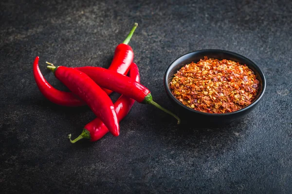 Dry Chili Pepper Flakes Crushed Red Peppers Bowl Black Table — Stock Photo, Image