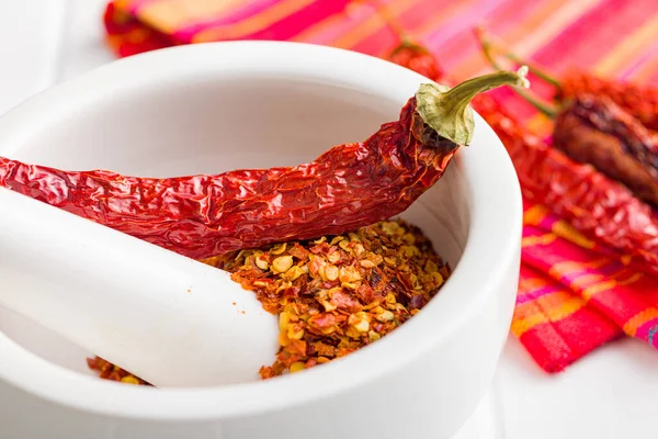 Dry Chili Pepper Flakes Crushed Red Peppers Mortar White Table — Stock Photo, Image