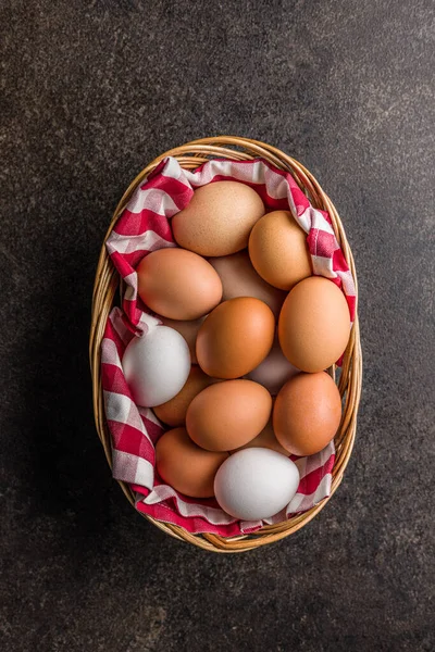 Whole Chicken Eggs Basket Black Table Top View — Stock Photo, Image