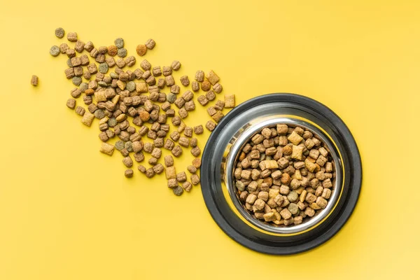 Dry Kibble Pet Food Dog Cat Food Bowl Yellow Background — Stock Photo, Image