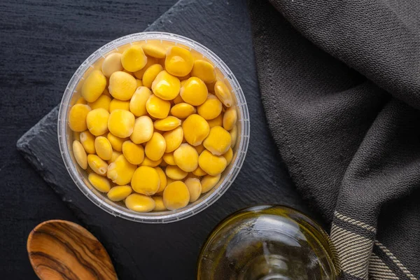Lupini Beans Brine Pickled Lupin Bowl Black Table Top View — 图库照片