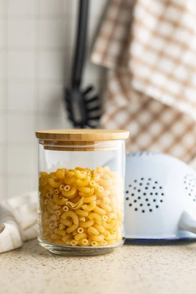 Raw Macaroni Pasta Glass Bottle Uncooked Rigatoni Glass Jar — Stock Photo, Image
