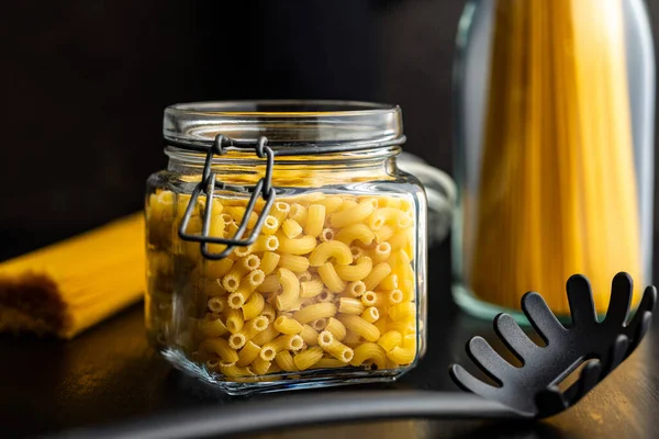 Raw Macaroni Pasta Glass Bottle Uncooked Rigatoni Jar — Stock Photo, Image