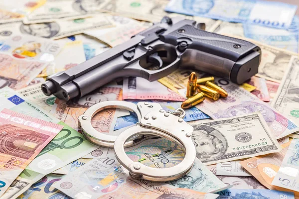 Handwapen Handboeien Verschillende Bankbiljetten Achtergrond — Stockfoto