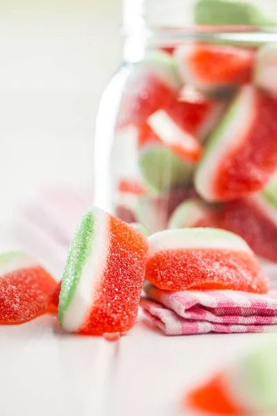 Watermelon jelly candies  on the  kitchen table.