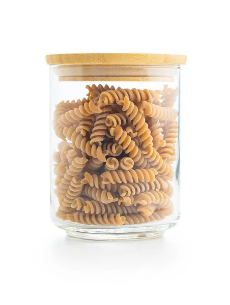Raw Whole Grain Fusilli Pasta Uncooked Pasta Jar Isolated White — Stock Photo, Image