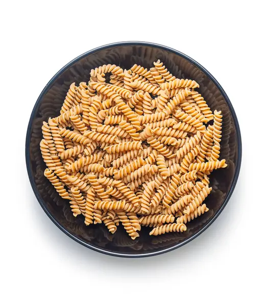 Raw Whole Grain Fusilli Pasta Uncooked Pasta Plate Isolated White — Stock Photo, Image