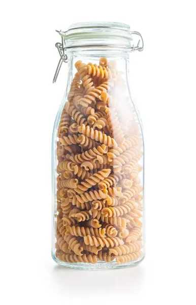 Raw Whole Grain Fusilli Pasta Uncooked Pasta Jar Isolated White — Stock Photo, Image