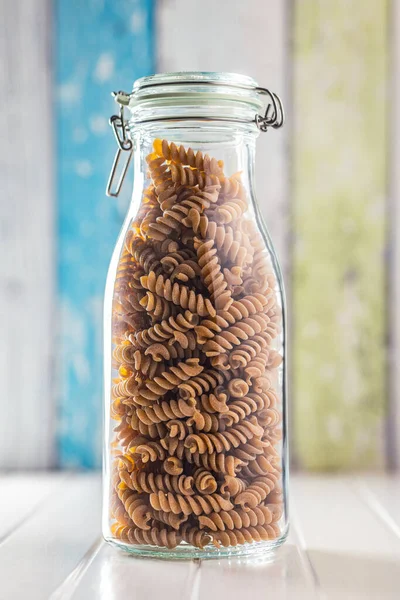 Raw Whole Grain Fusilli Pasta Uncooked Pasta Jar — Stock Photo, Image