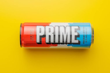 Prime Energy Drink . Bottle drink on the yellow background. Top view.