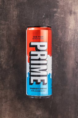 Prime Energy Drink . Bottle drink on the rustic background. Top view.