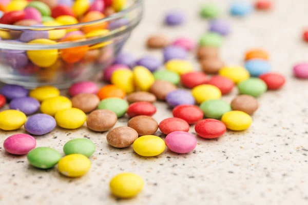 Colorful sweet candies on the kitchen table.