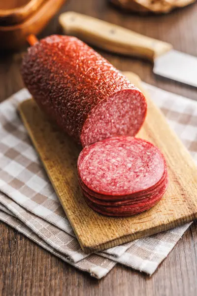 Sliced Smoked Salami Sausages Cutting Board Wooden Table — Stock Photo, Image