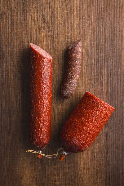 Sliced Salami Sausage Kitchen Table Top View — Stock Photo, Image