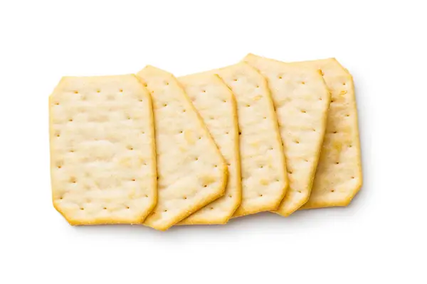 Crackers Impilati Una Superficie Bianca Pianura Isolato Sfondo Bianco — Foto Stock
