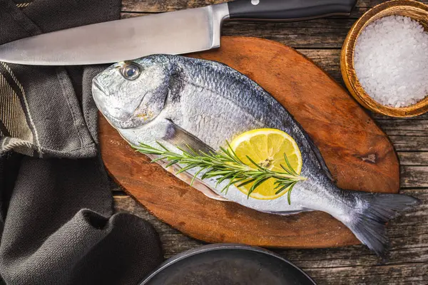 Fresh Sea Bream Fish Cutting Board Wooden Table Top View — Stock Photo, Image