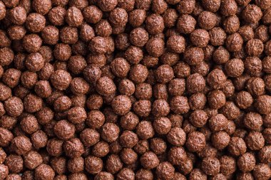 A breakfast cereal chocolate balls. Top view. clipart