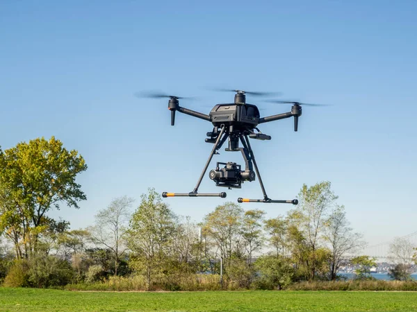 stock image Brooklyn, NY, USA - October 29, 2022: Sony presented a new professional Drone Airpeak S 1 -  world smallest drone that can carry a full frame Alpha series mirrorless camera at Calvert Vaux Park.