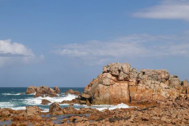 Rocky coast of Brittany - view point on Pink Granite Coast, Le Gouffre, Cote de Granit Rose, Plougrescant, Brittany, France clipart