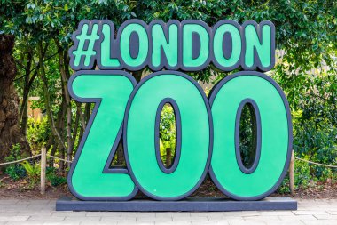 London, UK - 26 April 2024: The hastag London Zoo sign inside the ZSL Conservation zoo. Visitors are encouraged to pose here and take selfies for social media sites such as Instagram and Tic Tok. clipart