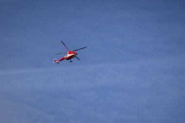 Zakopane, Poland - January 6, 2023: Rescue TOPR helicopter in the winter Tatra Mountains, Poland