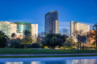 Valencia, Spain - January 19, 2023: Beautiful cityscape of Valencia with modern buildings at the park. Spain