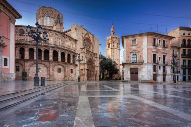 The Placa de la Verge square with amazing architecture in Valencia at dawn, Spain